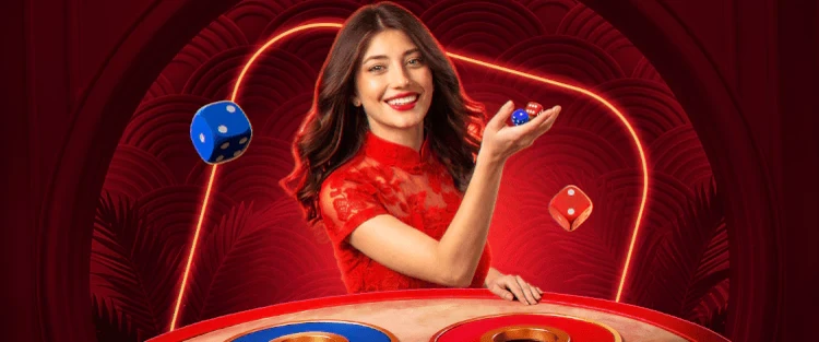 Live dealer holding casino chips at a red LEON table